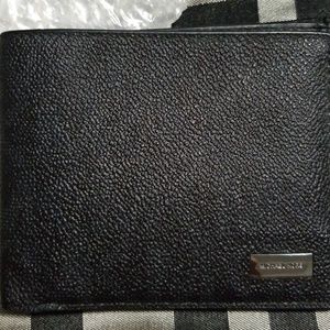 Michael Kors Used black Man wallet.
